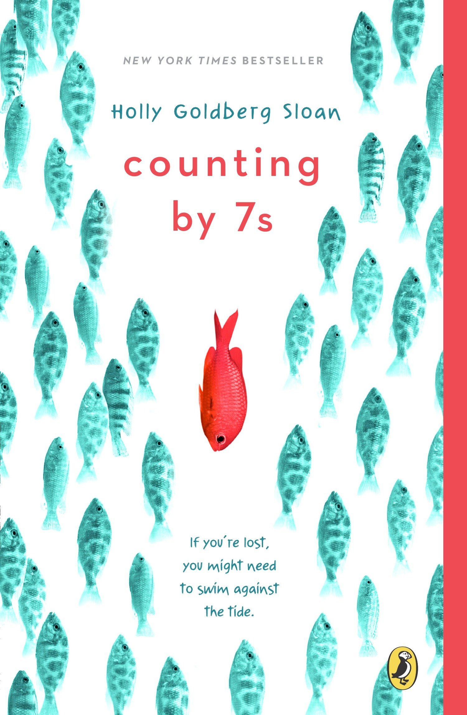 Cover of book Counting by Sevens, by Holly Goldberg Sloan, featuring a school of blue fish swimming up on a white background, while one red fish swims down in the middle