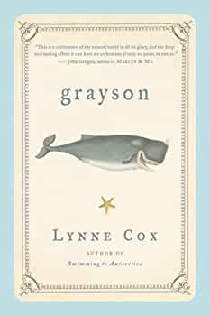 Cream colored book with alight blue trim and a drawing of a gray whale in the center, and the title "Grayson."