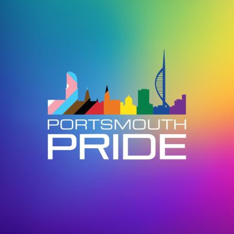 Portsmouth Pride colorful rainbow background with city buildings in foreground