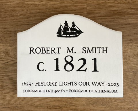 White house plaque with a ship, date c.1821, and recognition of the portsmouth athenaeum as a project supporter.