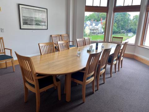 The Macleod Board Room has a large conference table. 