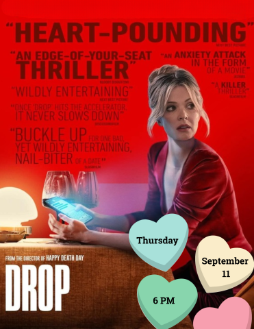 A woman in a red dress sits at a table with her cell phone and two glasses of wine. Drop September 11 6 pm