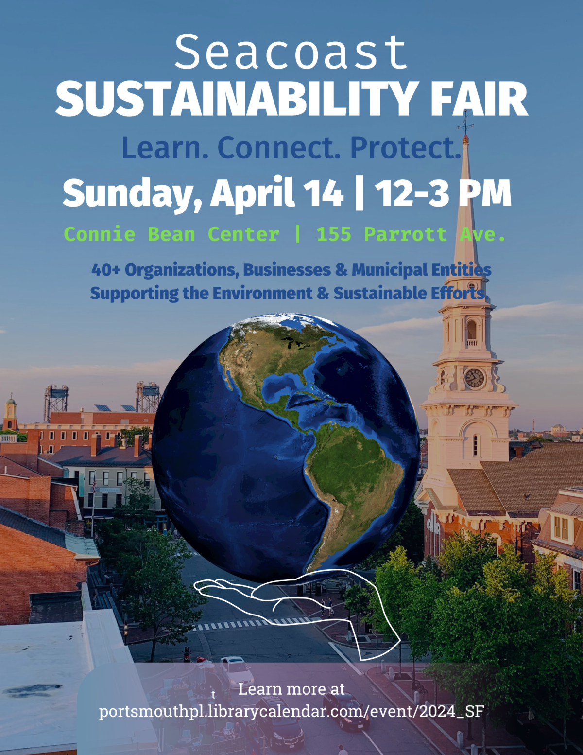 Globe held in palm of hand portsmouth nh in background sustainability fair